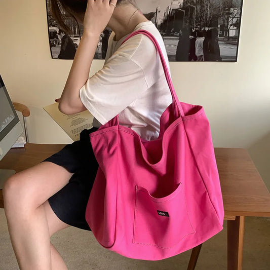 High Quality Reusable Canvas Shoulder Bag. Comes in Green and Yellow