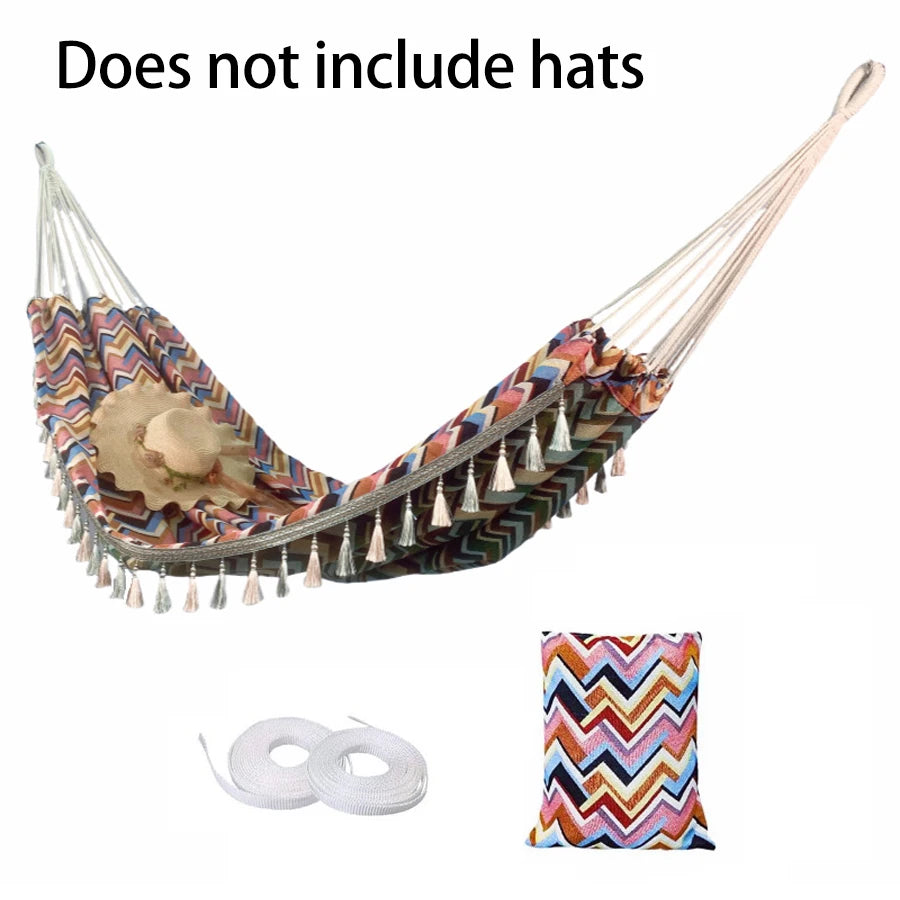A Bohemian ethnic style outdoor double hammock with a storage bag and binding ropes.