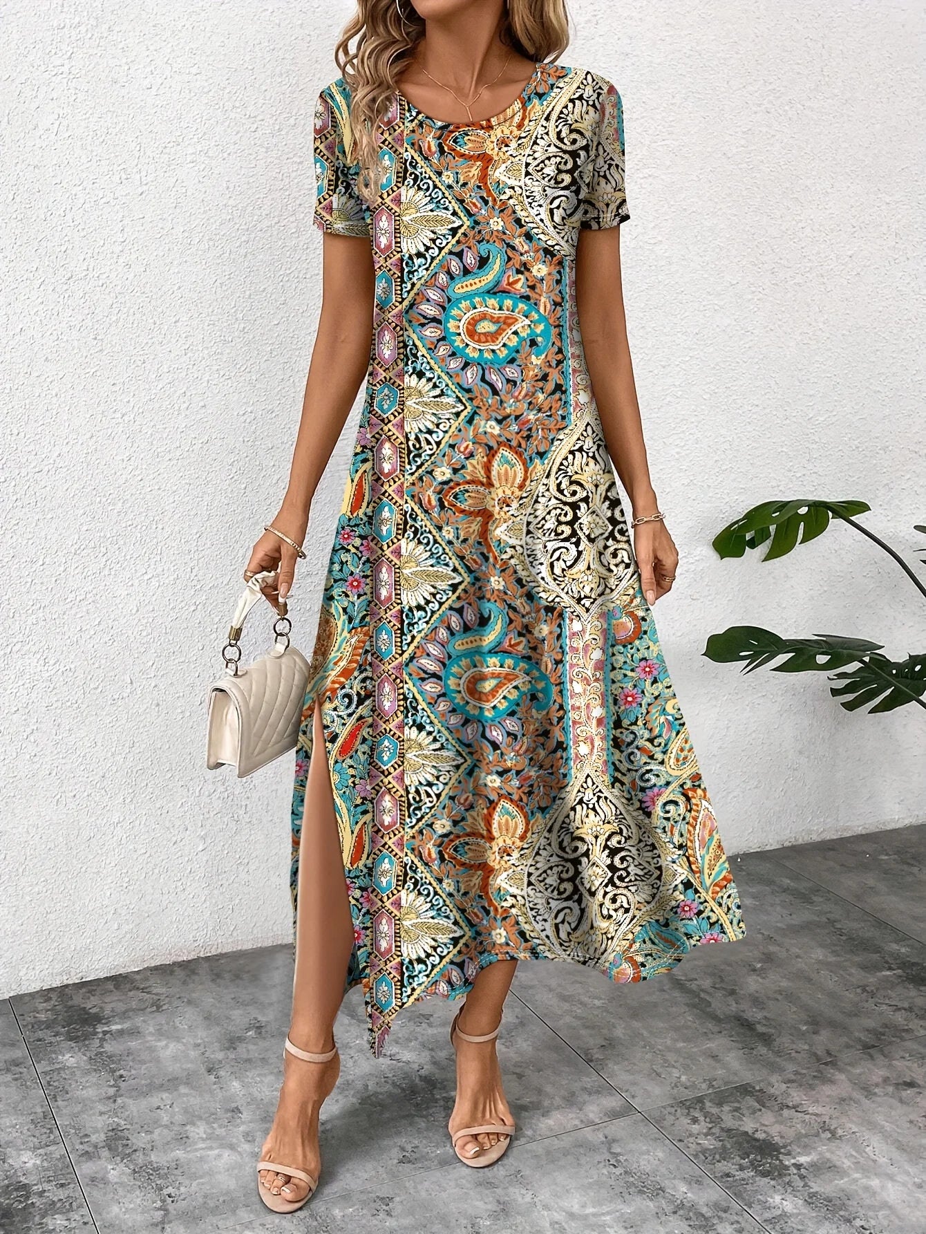 Sizes to 2XL Loose Casual Dress with short sleeves and a slit to just above the knee