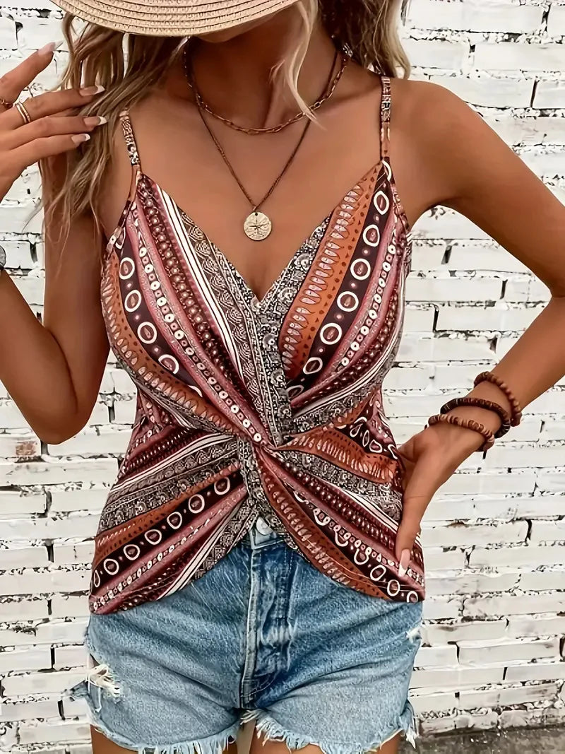 V-neck twisted front camisole top. Made of polyester fabric with spaghetti straps. Available in 7 colors