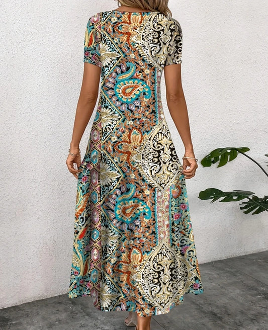 Sizes to 2XL Loose Casual Dress with short sleeves and a slit to just above the knee