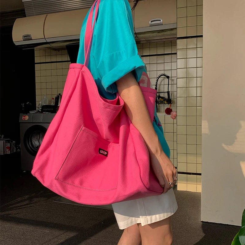 High Quality Reusable Canvas Shoulder Bag.  Comes in Green and Yellow
