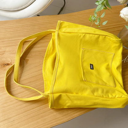 High Quality Reusable Canvas Shoulder Bag.  Comes in Green and Yellow