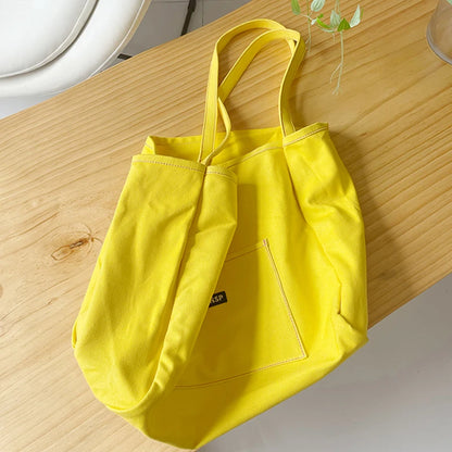 High Quality Reusable Canvas Shoulder Bag.  Comes in Green and Yellow