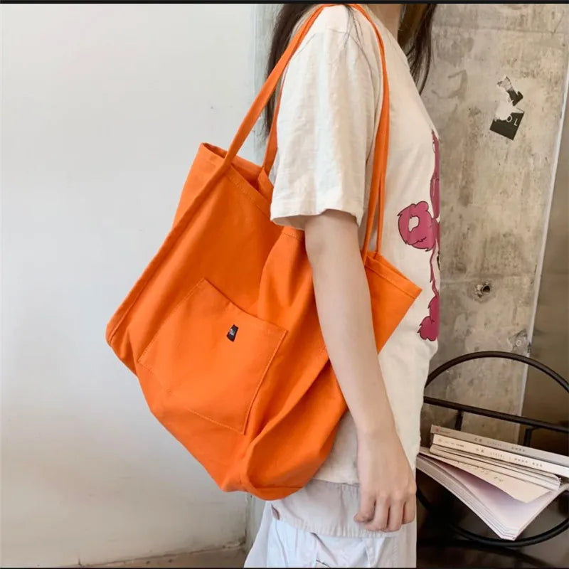 High Quality Reusable Canvas Shoulder Bag.  Comes in Green and Yellow