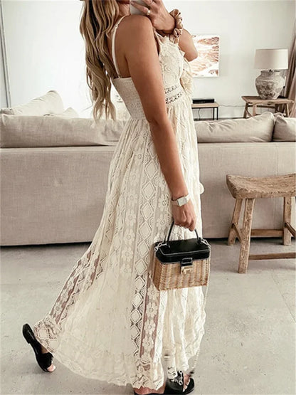 Retro Bohemian Lace, Sleeveless, V Neck, Flowy Ruffle Dress With Spaghetti Straps and Angled Hemline. Comes in Antique White and White