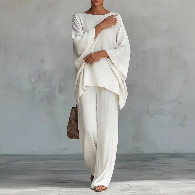 Retro Loose Linen, Long-Sleeved, Extra-Wide Legged Pantsuit, Angled Hem on Top Hem and Sleeves. Comes in Wine Red, White, Grey, Black, and Khaki