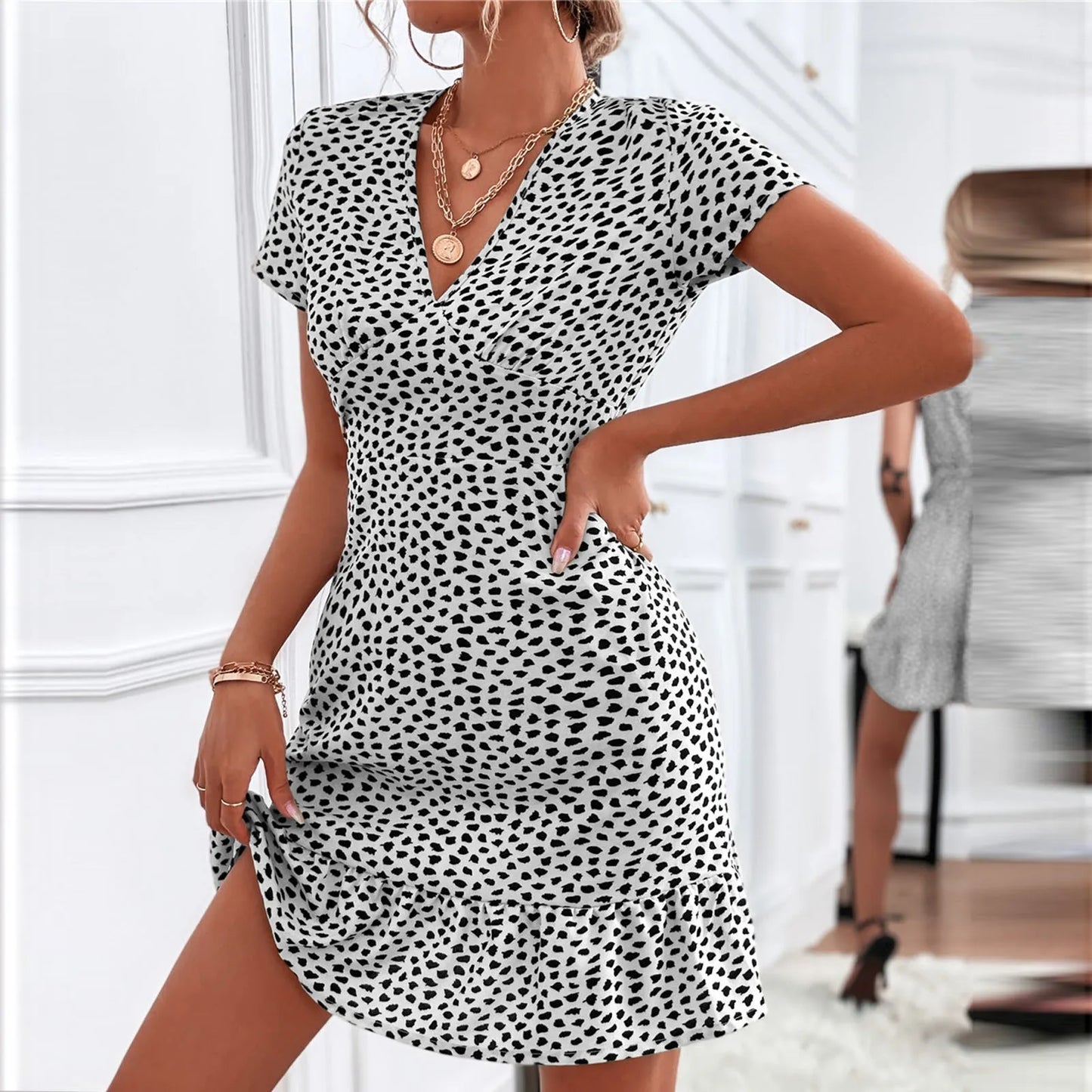 Floral Bohemian A-Line Dress with Ruffled Hem, V-Neck, Short Sleeves, and a Ruffle Hem