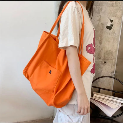 High Quality Reusable Canvas Shoulder Bag.  Comes in Green and Yellow