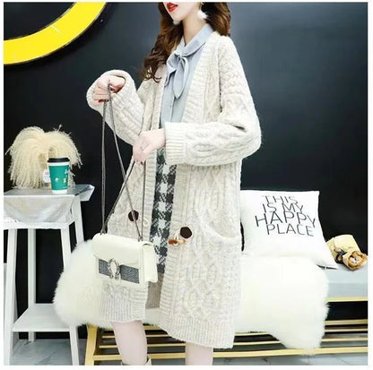 Cable Knitted Mid-Length Cardigan with Pockets and Two Large Black Buttons. Peach, Yellow, Off White, and Green