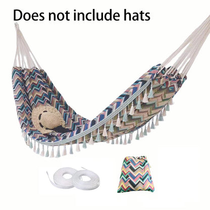 A Bohemian ethnic style outdoor double hammock with a storage bag and binding ropes.