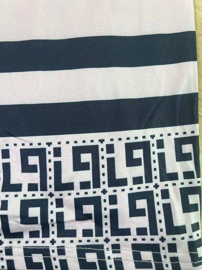 Sizes to 5XL, short-sleeved, round-neck, geometric ethnic borders, loose fit with pockets