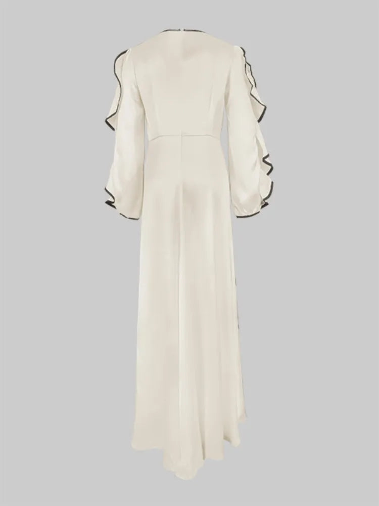 Boho Floor Length Evening Dress, Round Neck, Open Ruffled Sleeves trimmed in Black, Dress has an artistic Black on White Floral Design