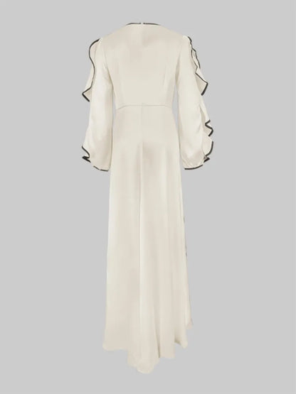 Boho Floor Length Evening Dress, Round Neck, Open Ruffled Sleeves trimmed in Black, Dress has an artistic Black on White Floral Design