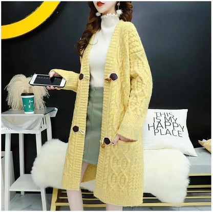 Cable Knitted Mid-Length Cardigan with Pockets and Two Large Black Buttons. Peach, Yellow, Off White, and Green