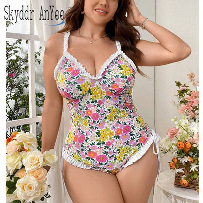 Sizes 1XL to 4XL, One Piece Swimsuit, Flower Printed, Adjustable Straps, and Lined with Lace