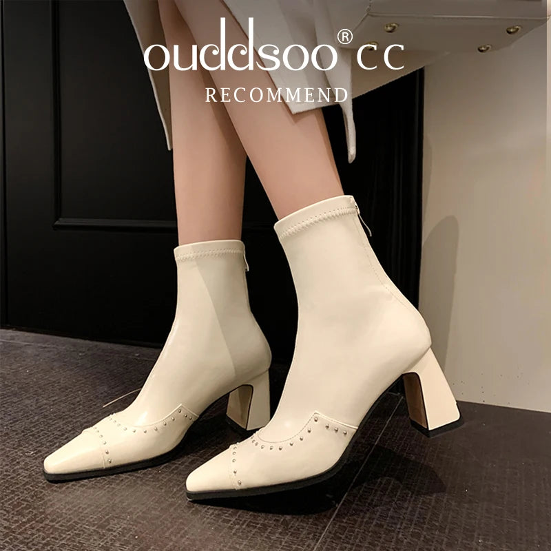 Rivetted Boots with Square Toes and Chunky Heels. Over the Ankle Stretch Tops