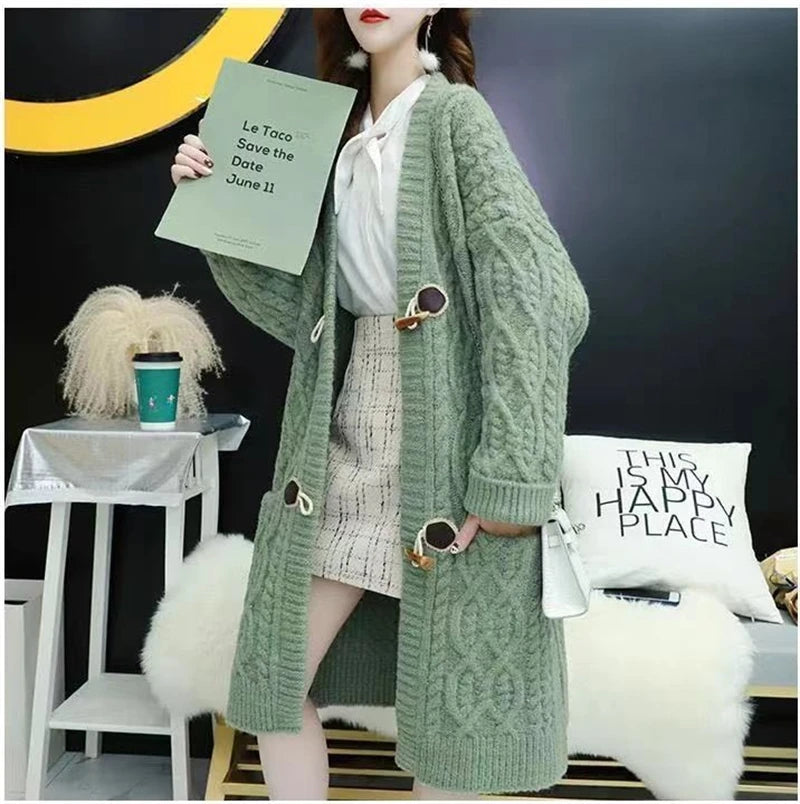 Cable Knitted Mid-Length Cardigan with Pockets and Two Large Black Buttons. Peach, Yellow, Off White, and Green