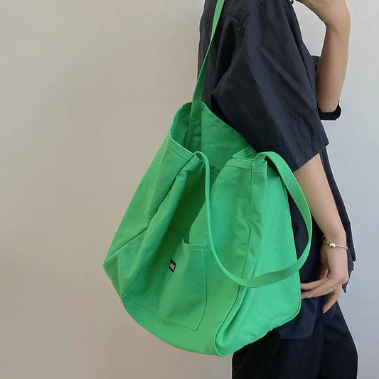 High Quality Reusable Canvas Shoulder Bag.  Comes in Green and Yellow
