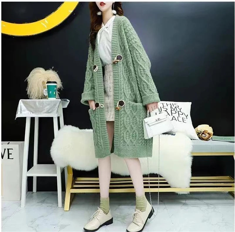 Cable Knitted Mid-Length Cardigan with Pockets and Two Large Black Buttons. Peach, Yellow, Off White, and Green