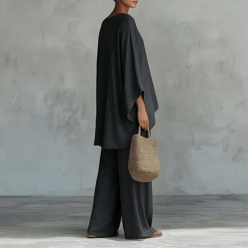 Retro Loose Linen, Long-Sleeved, Extra-Wide Legged Pantsuit, Angled Hem on Top Hem and Sleeves. Comes in Wine Red, White, Grey, Black, and Khaki