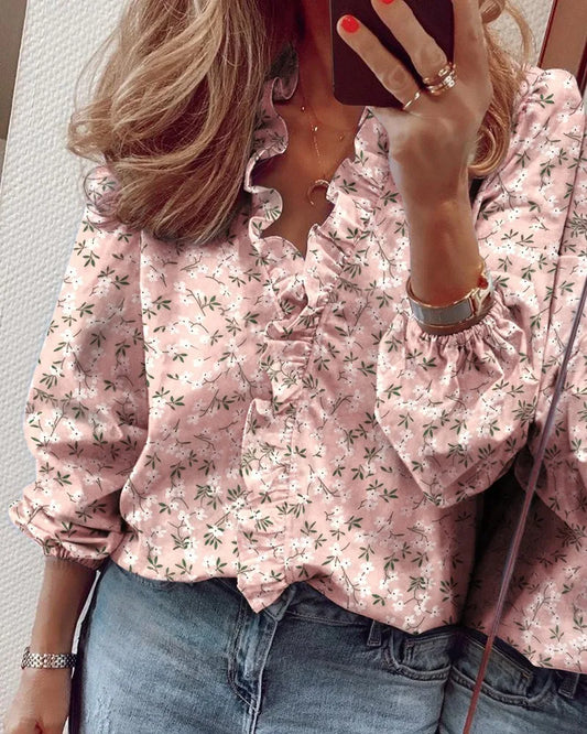 Available in 5 Solid colors Sizes to 2XL Long-sleeved ruffled front Pullover shirt