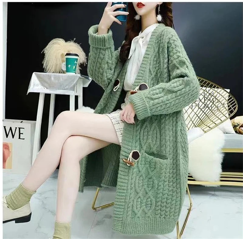 Cable Knitted Mid-Length Cardigan with Pockets and Two Large Black Buttons. Peach, Yellow, Off White, and Green
