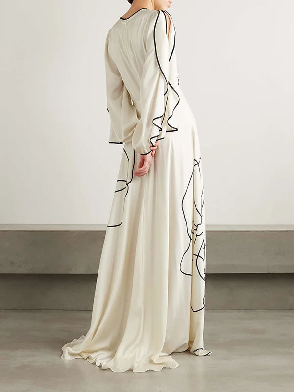 Boho Floor Length Evening Dress, Round Neck, Open Ruffled Sleeves trimmed in Black, Dress has an artistic Black on White Floral Design