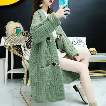 Cable Knitted Mid-Length Cardigan with Pockets and Two Large Black Buttons. Peach, Yellow, Off White, and Green