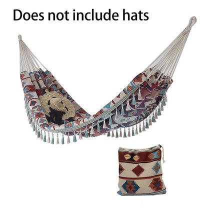 A Bohemian ethnic style outdoor double hammock with a storage bag and binding ropes.