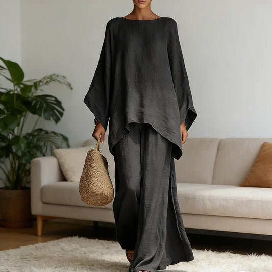 Retro Loose Linen, Long-Sleeved, Extra-Wide Legged Pantsuit, Angled Hem on Top Hem and Sleeves. Comes in Wine Red, White, Grey, Black, and Khaki
