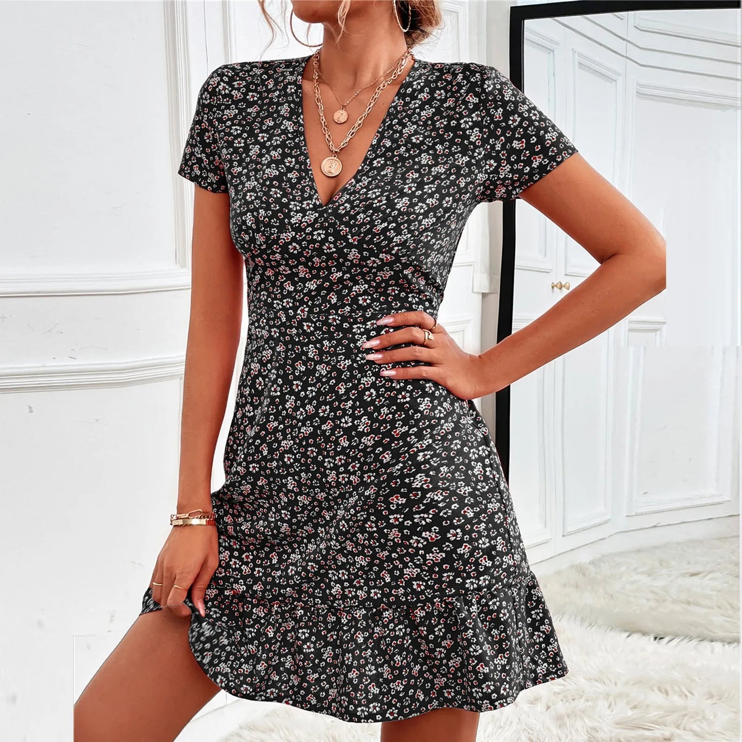 Floral Bohemian A-Line Dress with Ruffled Hem, V-Neck, Short Sleeves, and a Ruffle Hem