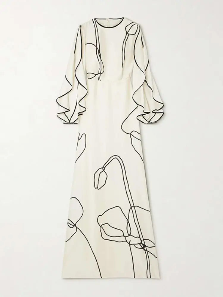 Boho Floor Length Evening Dress, Round Neck, Open Ruffled Sleeves trimmed in Black, Dress has an artistic Black on White Floral Design