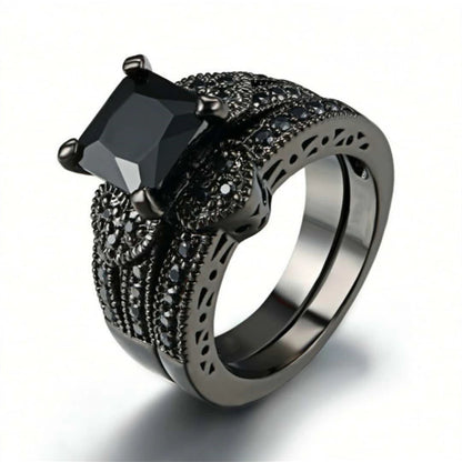 Black Stainless Steel Ring Sets, Women's Black Stone Engagement with a small heart band.  Men's is all Black Stainless Steel