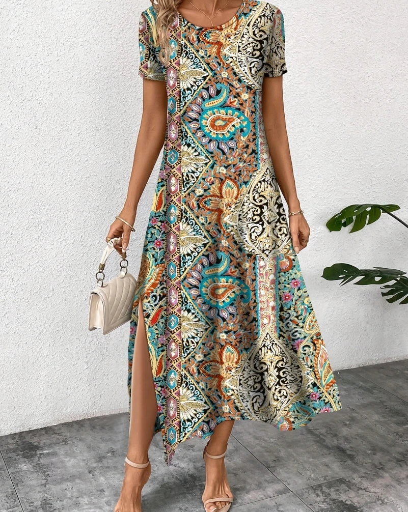 Sizes to 2XL  Loose Casual Dress with short sleeves and a slit to just above the knee