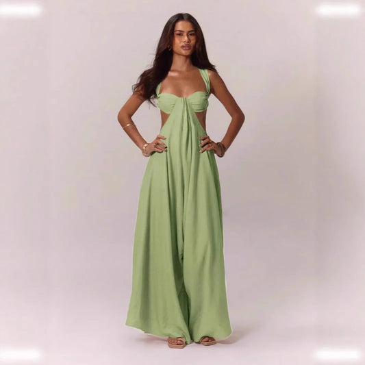 Elegant Jumpsuit in a variety of colors. Sides and back out, straps that connect on the Open backside. Large skirt-like pants. Remarkable design