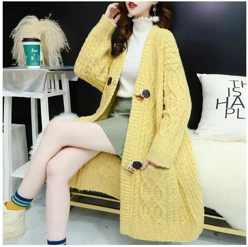 Cable Knitted Mid-Length Cardigan with Pockets and Two Large Black Buttons. Peach, Yellow, Off White, and Green