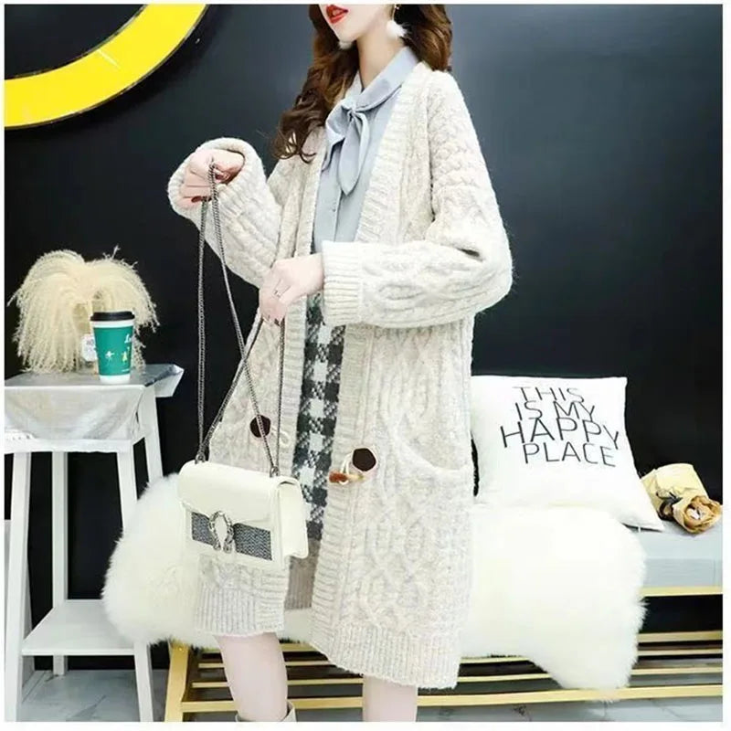 Cable Knitted Mid-Length Cardigan with Pockets and Two Large Black Buttons. Peach, Yellow, Off White, and Green