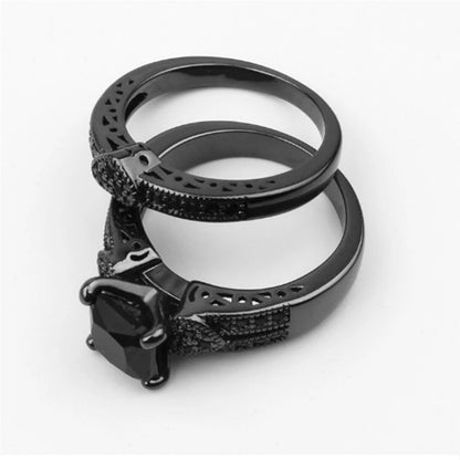 Black Stainless Steel Ring Sets, Women's Black Stone Engagement with a small heart band.  Men's is all Black Stainless Steel