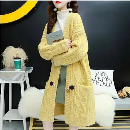 Cable Knitted Mid-Length Cardigan with Pockets and Two Large Black Buttons. Peach, Yellow, Off White, and Green