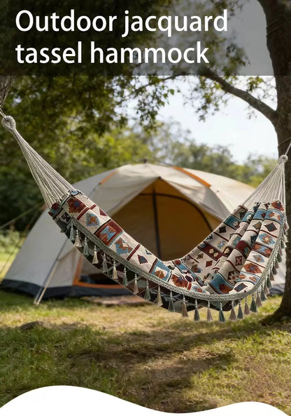 A Bohemian ethnic style outdoor double hammock with a storage bag and binding ropes.