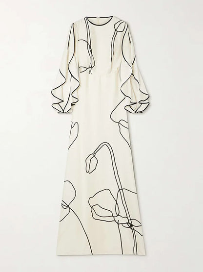 Boho Floor Length Evening Dress, Round Neck, Open Ruffled Sleeves trimmed in Black, Dress has an artistic Black on White Floral Design