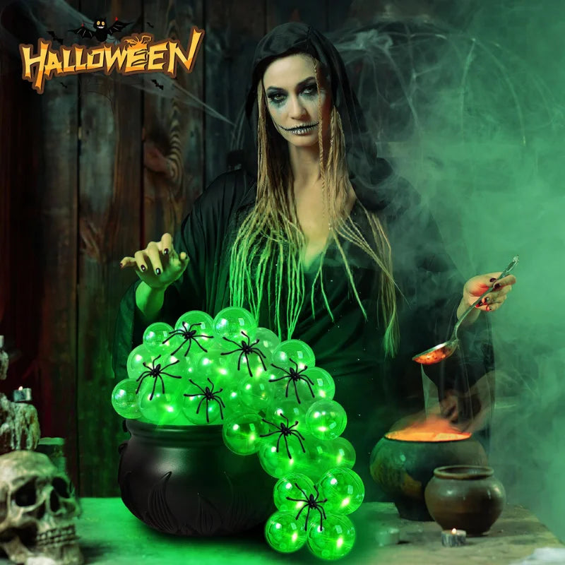 Indoor Halloween DIY Bubbling Witch Cauldron. Consists of 1 witch cauldron, cotton filling, 40 clear balls, and a string of twinkling lights, glue, and 10 simulated spiders.