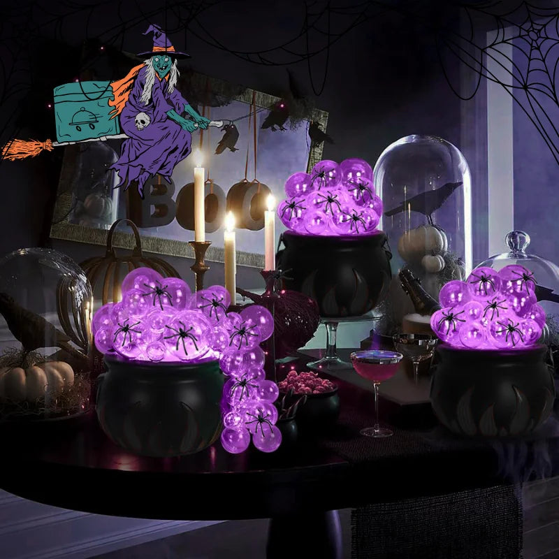 Indoor Halloween DIY Bubbling Witch Cauldron. Consists of 1 witch cauldron, cotton filling, 40 clear balls, and a string of twinkling lights, glue, and 10 simulated spiders.