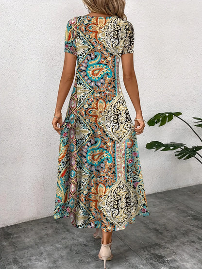 Sizes to 2XL  Loose Casual Dress with short sleeves and a slit to just above the knee