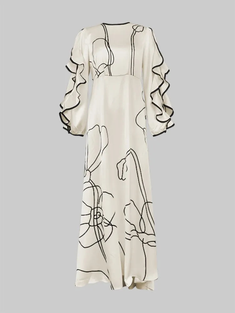 Boho Floor Length Evening Dress, Round Neck, Open Ruffled Sleeves trimmed in Black, Dress has an artistic Black on White Floral Design