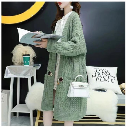 Cable Knitted Mid-Length Cardigan with Pockets and Two Large Black Buttons. Peach, Yellow, Off White, and Green