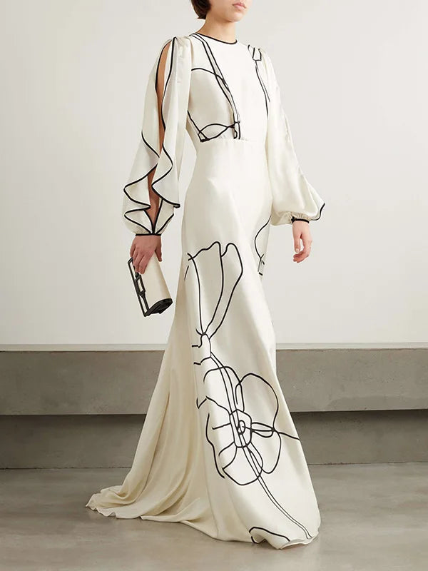 Boho Floor Length Evening Dress, Round Neck, Open Ruffled Sleeves trimmed in Black, Dress has an artistic Black on White Floral Design