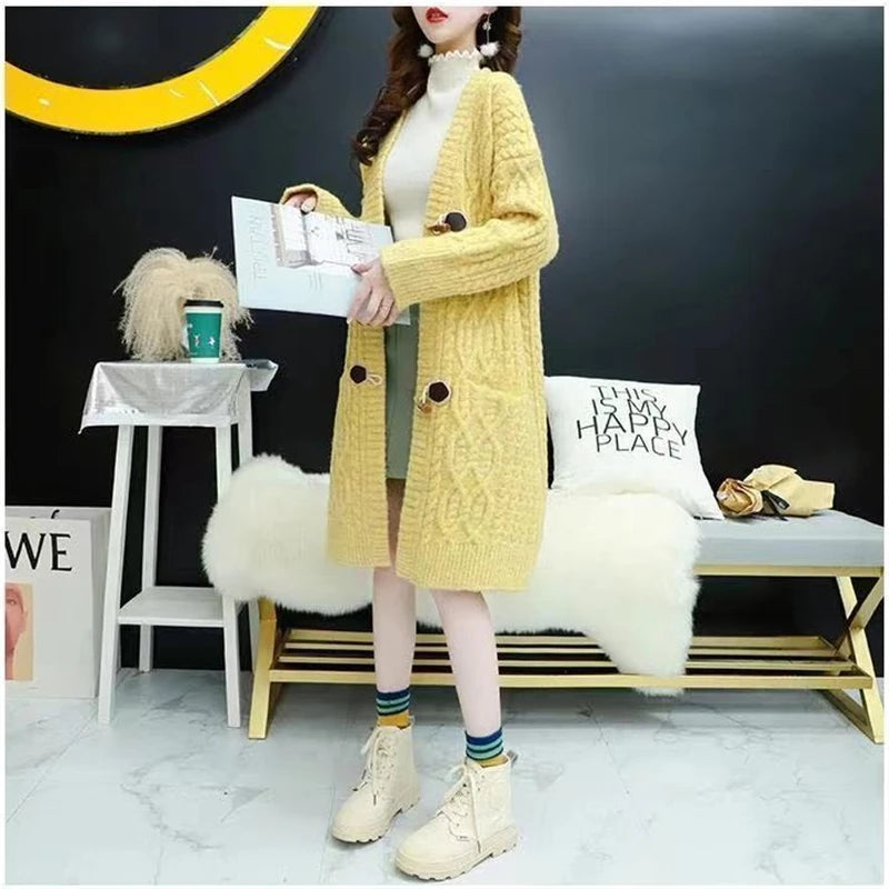 Cable Knitted Mid-Length Cardigan with Pockets and Two Large Black Buttons. Peach, Yellow, Off White, and Green