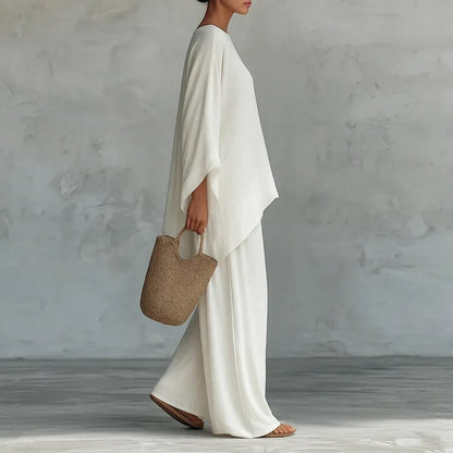 Retro Loose Linen, Long-Sleeved, Extra-Wide Legged Pantsuit, Angled Hem on Top Hem and Sleeves. Comes in Wine Red, White, Grey, Black, and Khaki